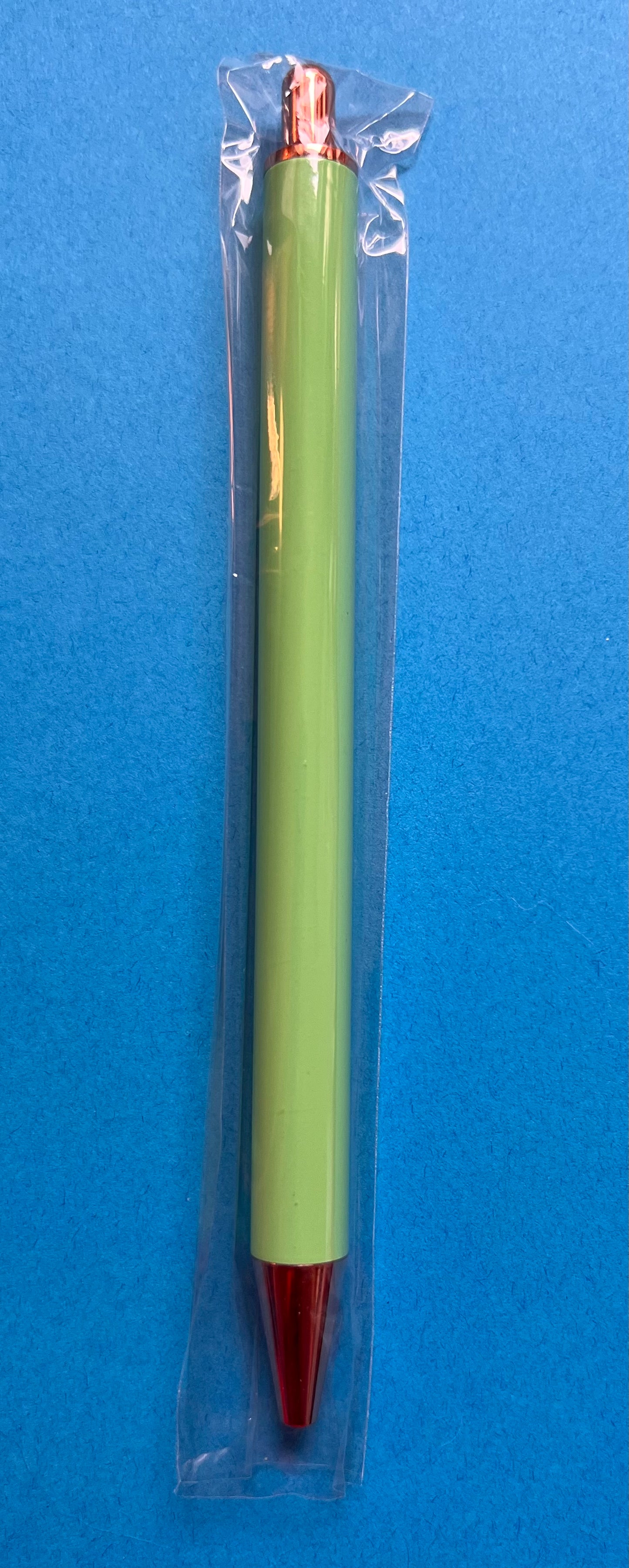 Light green metal pen rose gold tip