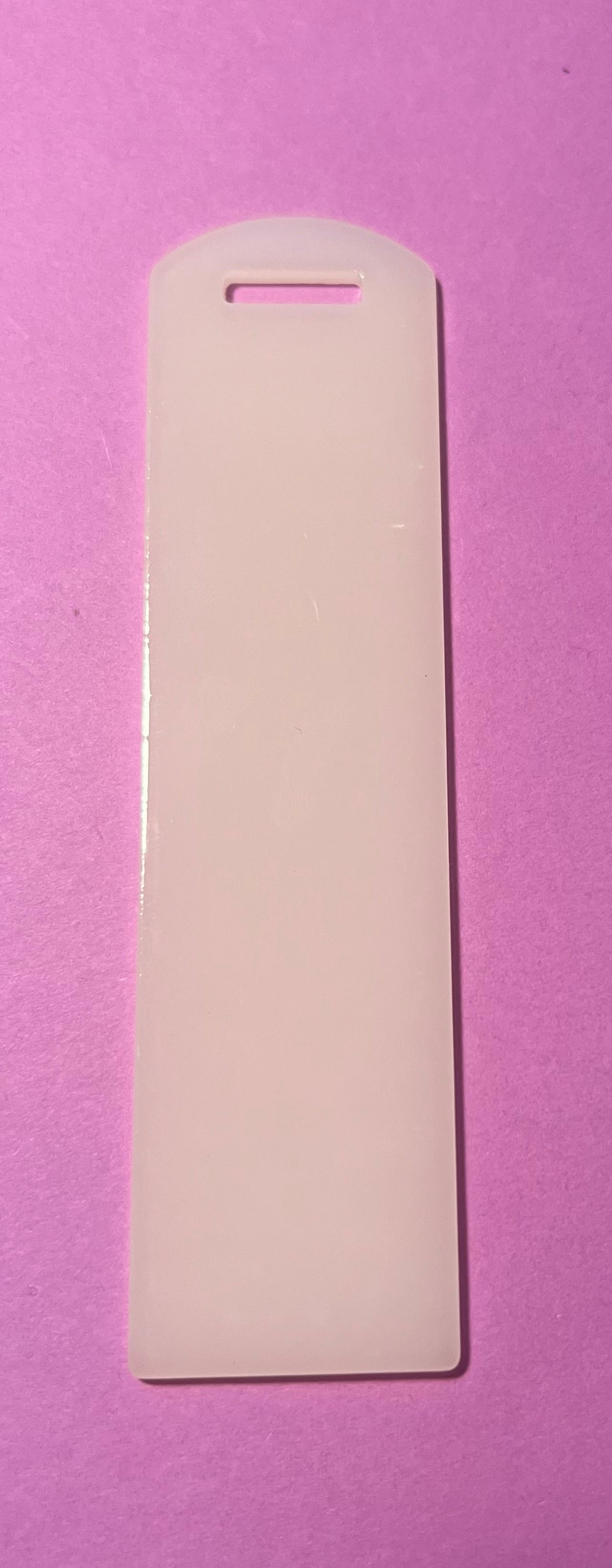 Glow in the dark white acrylic bookmark